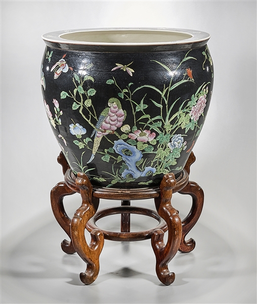 Appraisal: Chinese black ground porcelain fish bowl with birds to exterior