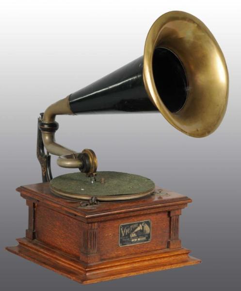 Appraisal: Victor E Phonograph with Small Brass Bell Horn Description Horn