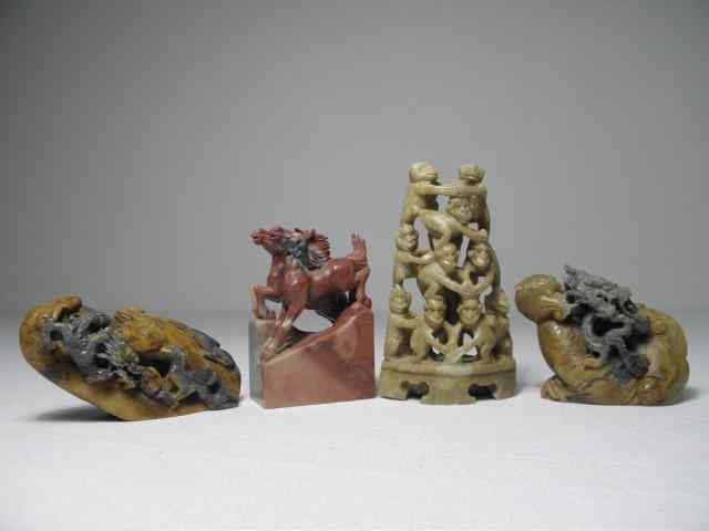 Appraisal: Lot of four Chinese stone carvings Includes a carving depicting