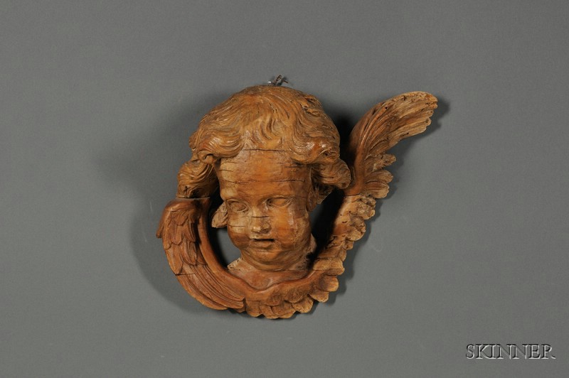 Appraisal: Carved Fruitwood Putto Wall Plaque formed as the head and