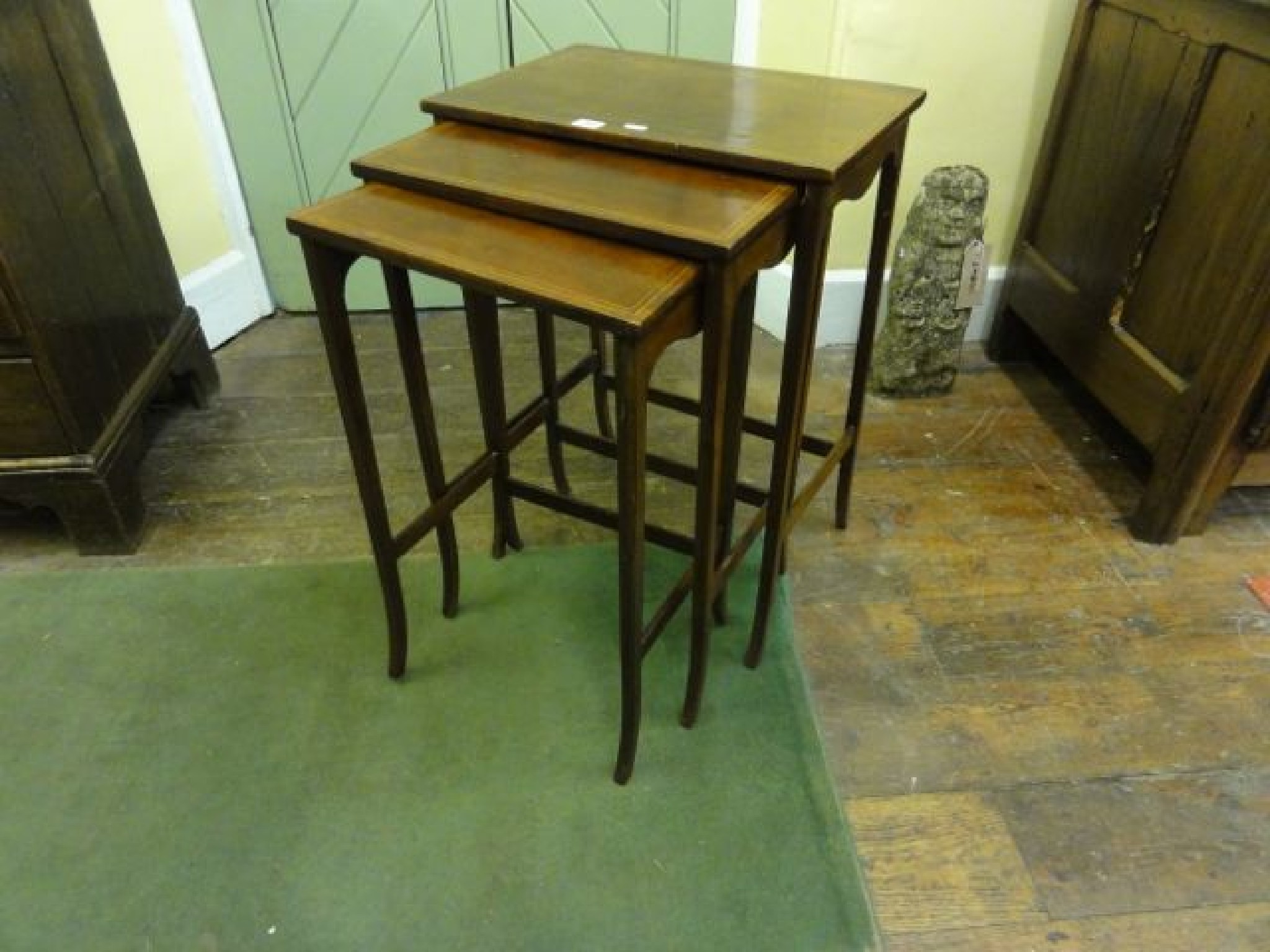 Appraisal: Three Edwardian mahogany occasional tables with chequered string inlay arranged