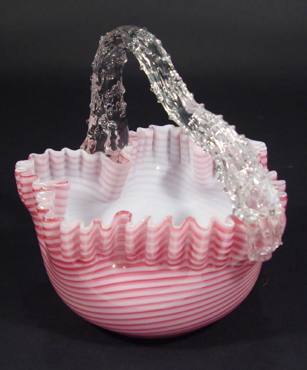 Appraisal: Shaped Victorian glass basket with pink and white trailed decoration