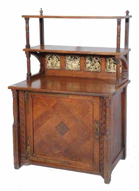 Appraisal: AN ARTS AND CRAFTS OAK SIDE CABINET the two tier