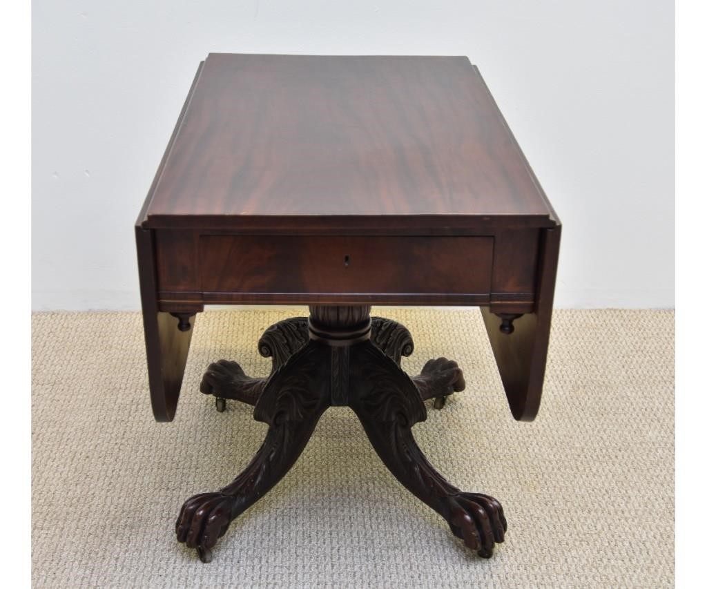 Appraisal: Philadelphia Empire mahogany drop leaf table with finely carved acanthus