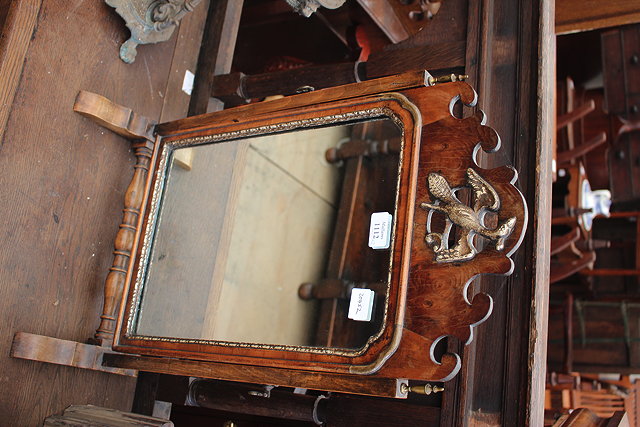 Appraisal: A GEORGIAN STYLE SWING DRESSING TABLE MIRROR with pierced fretwork