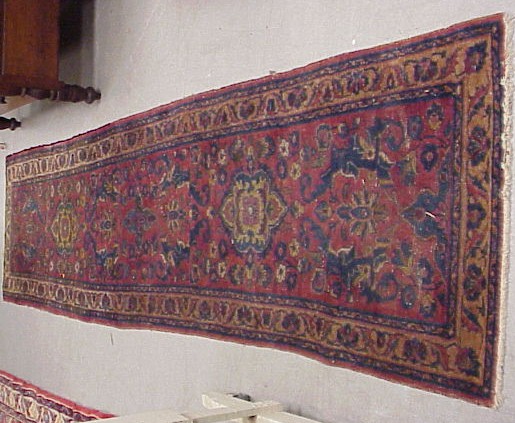 Appraisal: Antique Persian Lilihan runner ' x ' burgundy field with