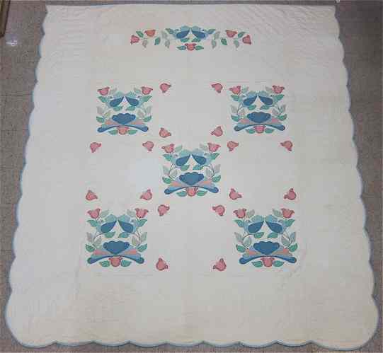 Appraisal: AMISH HAND STITCHED QUILT with appliqued tulip and bird motif