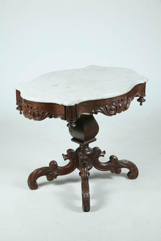 Appraisal: MARBLE TOP TABLE White turtle shaped top on a grain