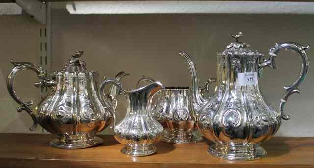 Appraisal: A VICTORIAN SILVER PLATED FOUR PIECE TEA AND COFFEE SERVICE