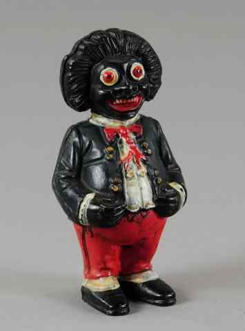 Appraisal: GOLLIWOG STILL BANK John Harper England cast iron extensive paint