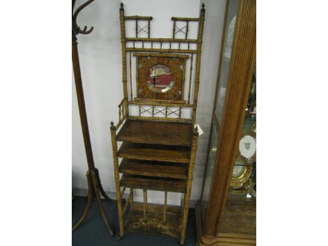 Appraisal: Victorian Bamboo Eterge Shelf Unit round mirror back tall