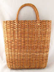 Appraisal: A lined woven cane carry bag by Fendi x x