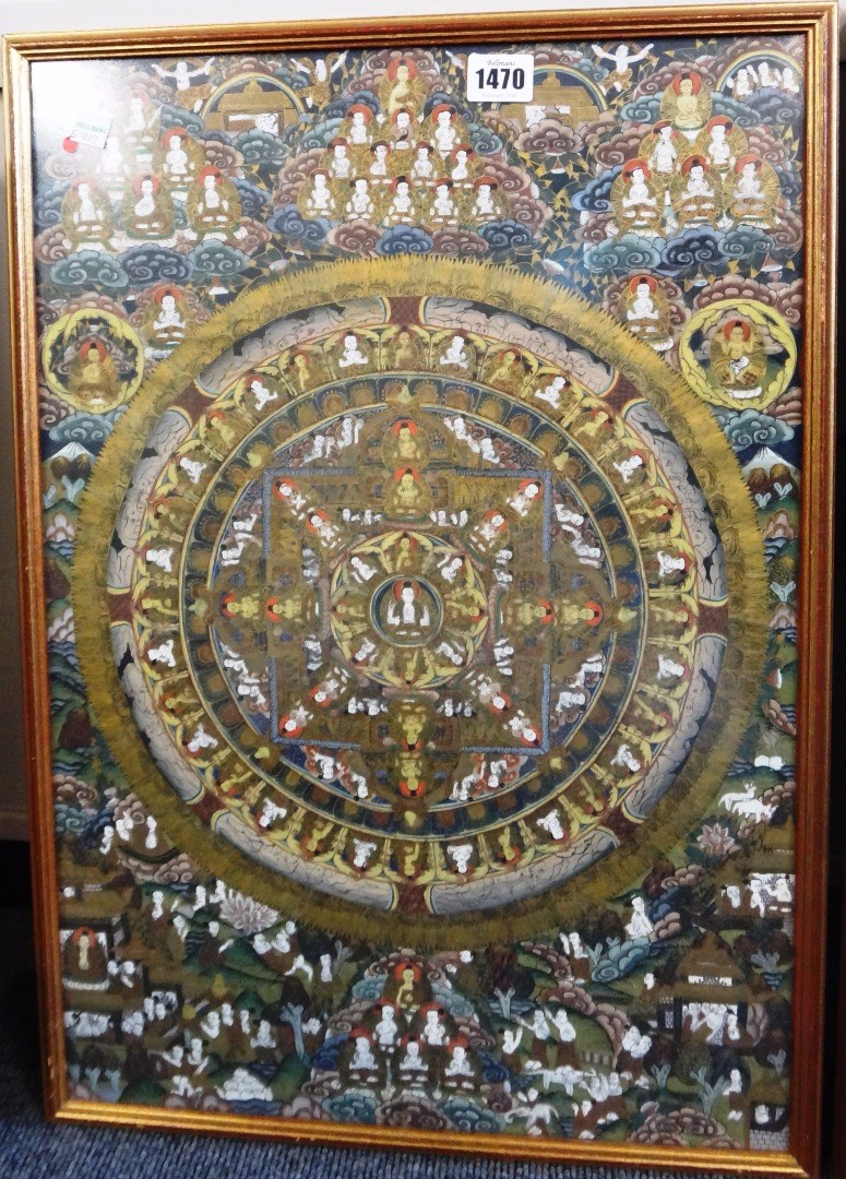 Appraisal: A Tibetan mandala thanka painted in the centre with Buddha