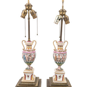 Appraisal: A Pair of Capodimonte Porcelain Urns Mounted as Lamps th