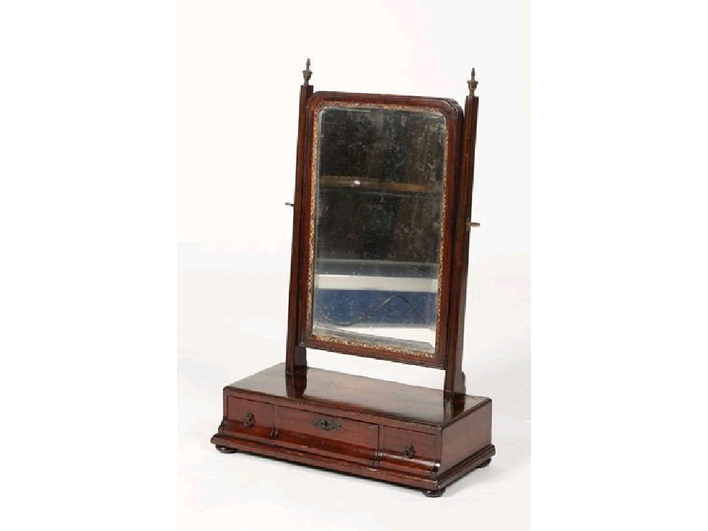 Appraisal: A GEORGE III MAHOGANY DRESSING MIRROR the bevelled glass plate