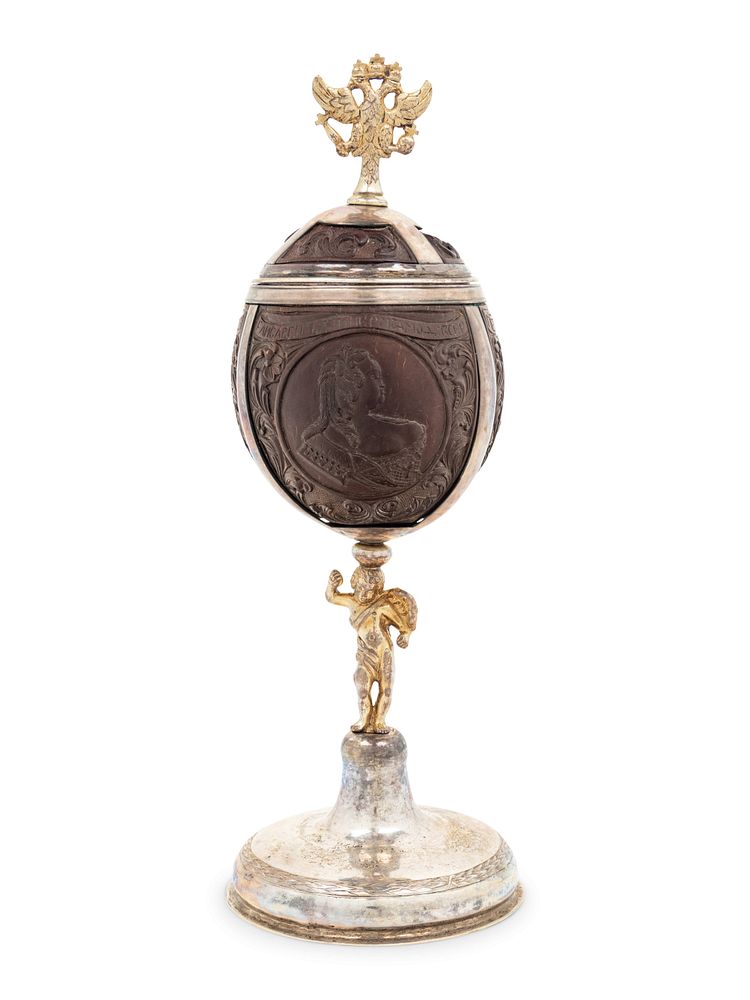 Appraisal: A Silver-Gilt Mounted Carved Coconut Cup and Cover of Russian