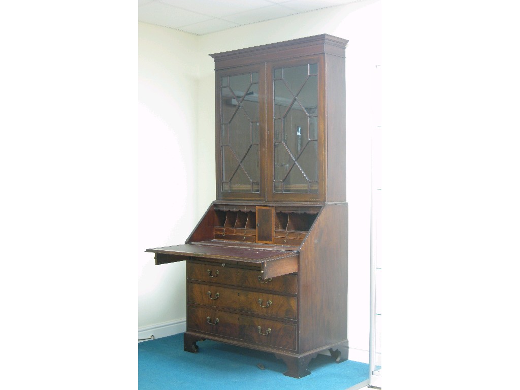 Appraisal: A Georgian mahogany Bureau Bookcase the later upper section having