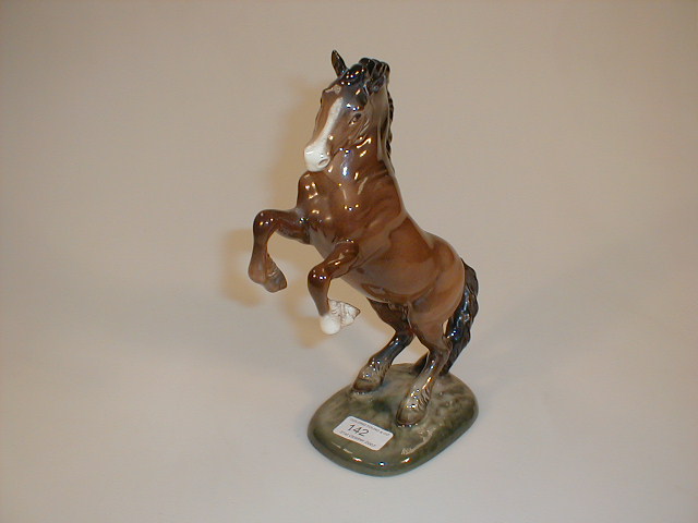 Appraisal: A Beswick figure of a rearing horse model no high