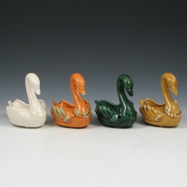 Appraisal: Hull Imperial Miniature Swans Lot of four miniature swans in