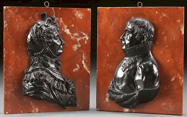 Appraisal: A PAIR OF CAST IRON RELIEF PROFILE BUST PLAQUES A