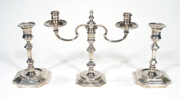 Appraisal: Silver two branch candelabra and a matched pair of candlesticks