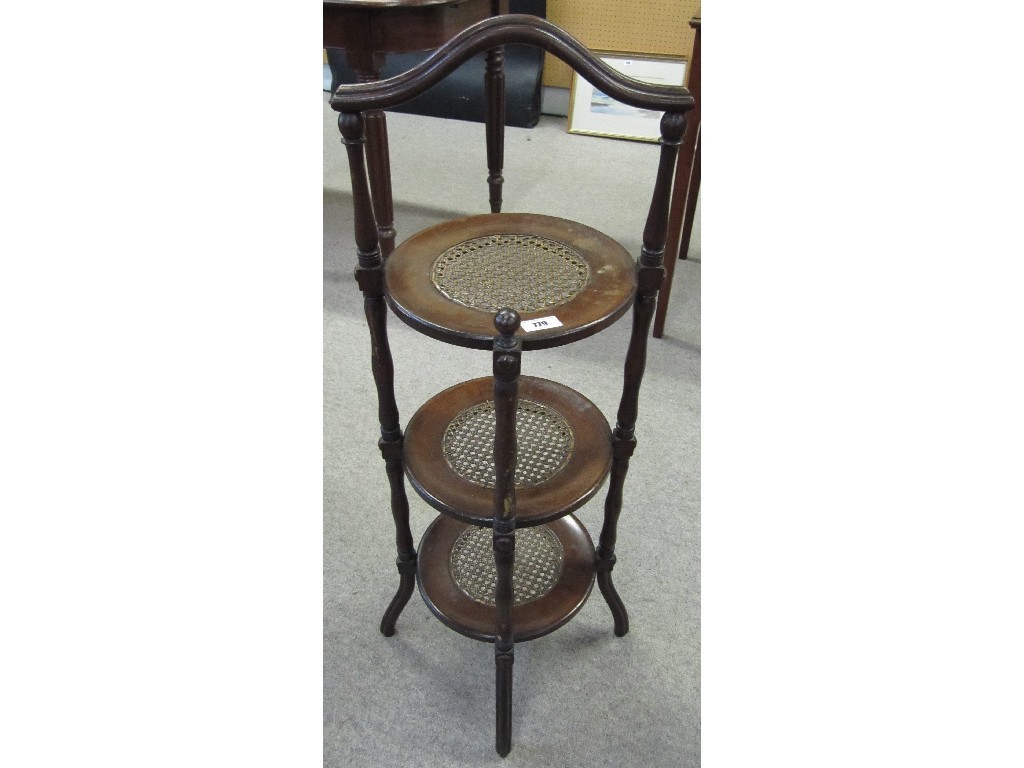 Appraisal: Mahogany and cane mounted three tier cakestand