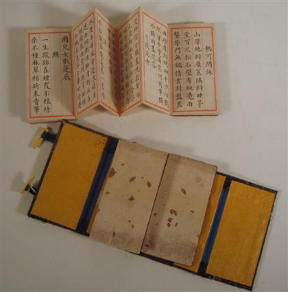 Appraisal: Chinese two-volume poetic manuscript The two-volume manuscript with gold-speckled end