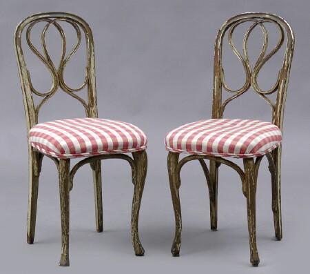 Appraisal: PAIR OF PAINTED AND PARCEL-GILT BENTWOOD BALLROOM CHAIRS Each pierced