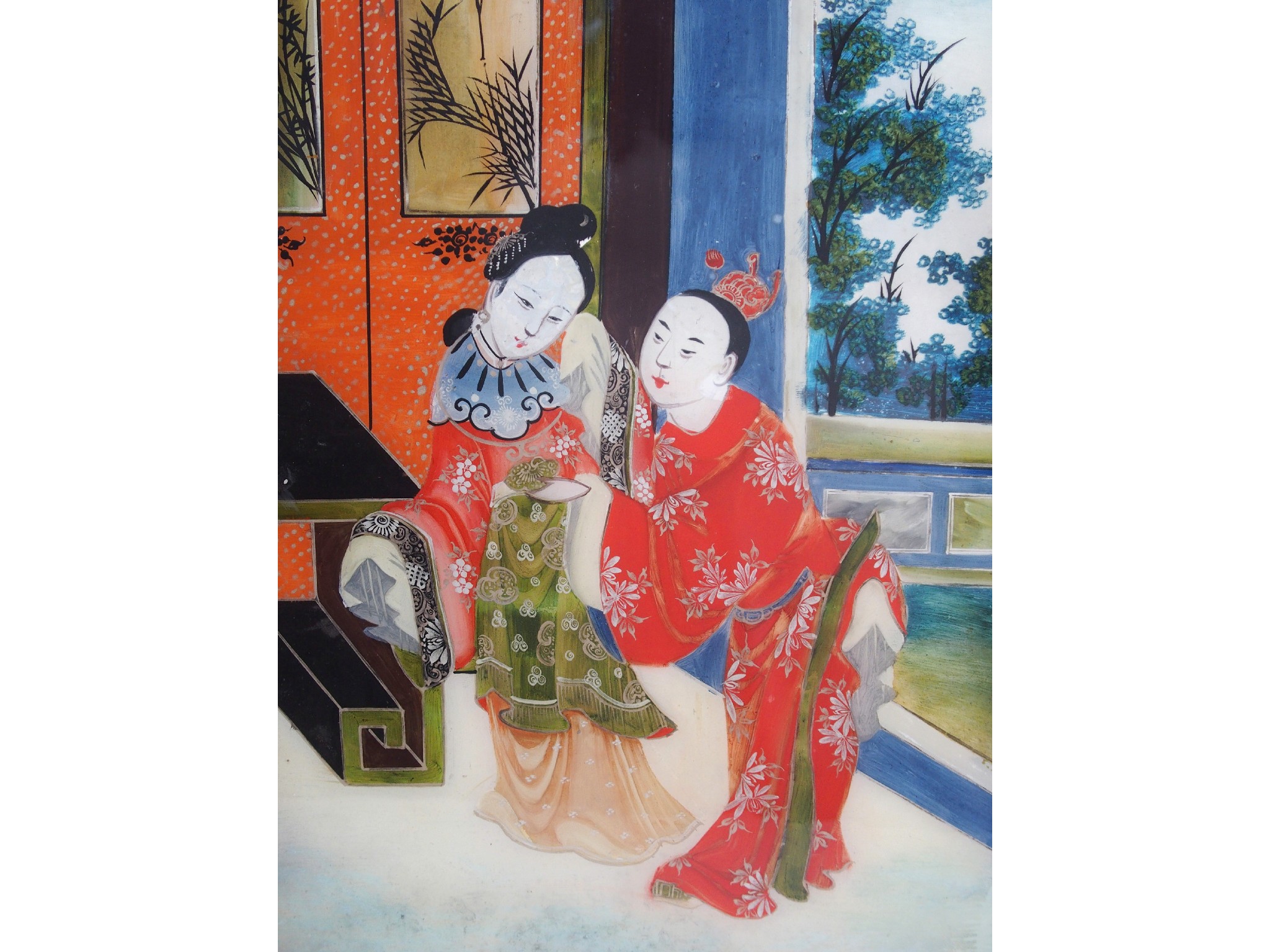 Appraisal: A Chinese reverse painted glass picture of a coupleon a