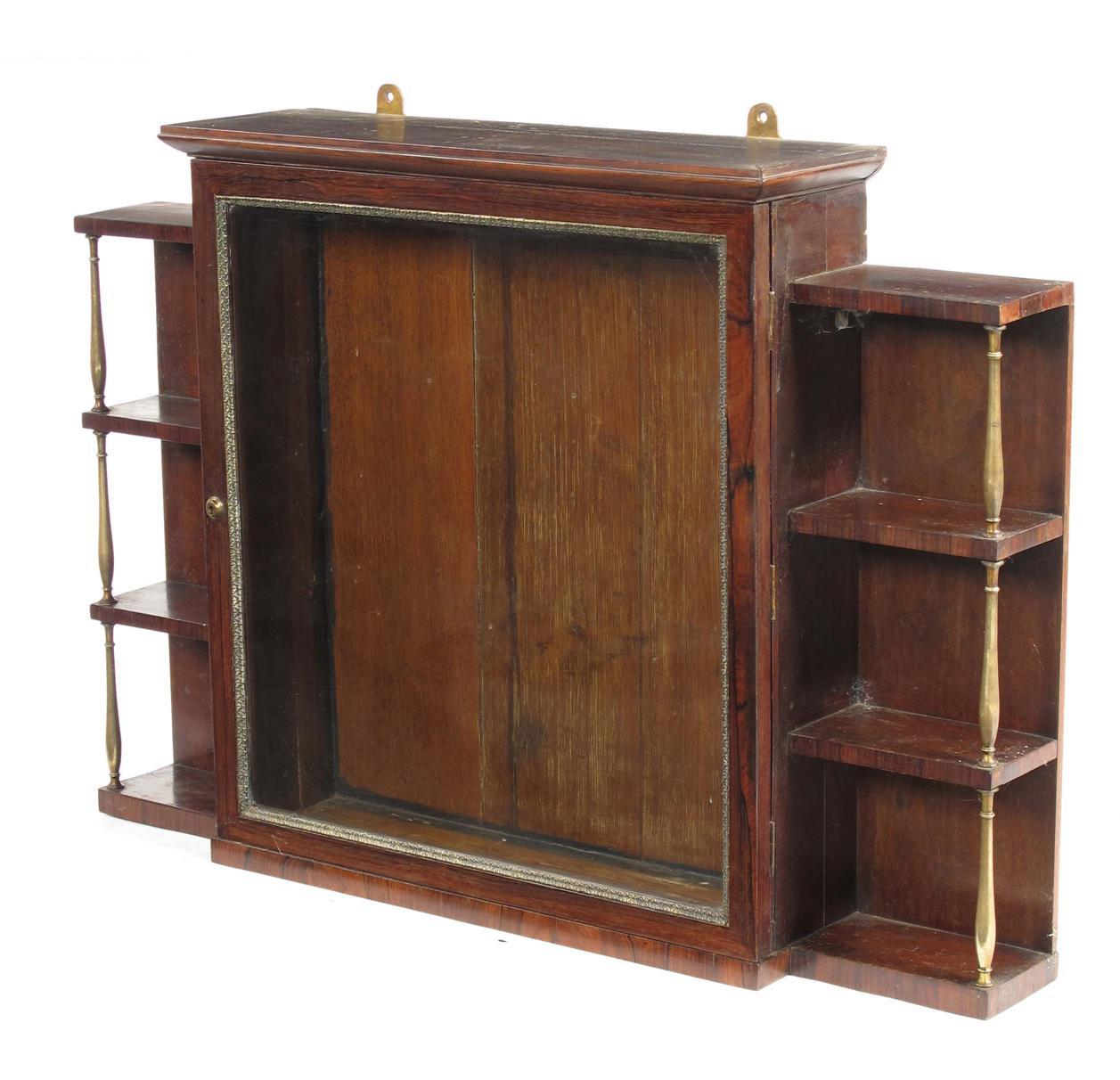 Appraisal: A late th century rosewood and brass mounted wall cabinet