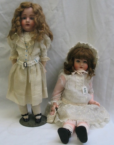 Appraisal: TWO BISQUE HEAD GIRL DOLLS One is a bisque toddler