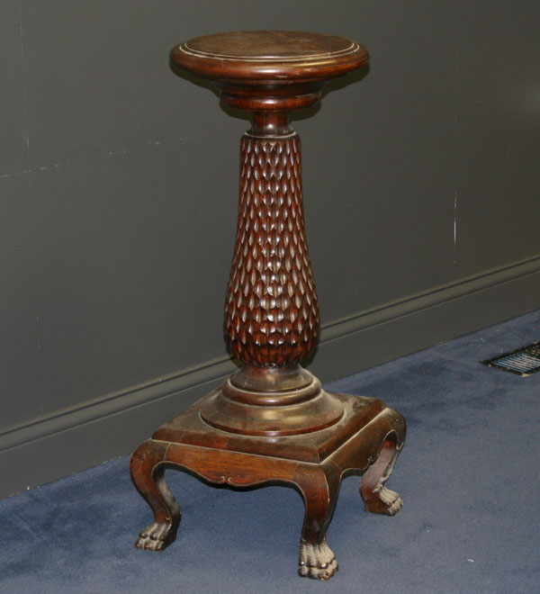 Appraisal: Carved oak pedestal with claw feet unusual pineapple form mounted