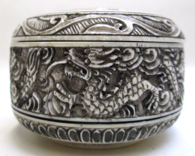 Appraisal: CHINESE QING IVORY CARVED BOX with dragon and flame motif