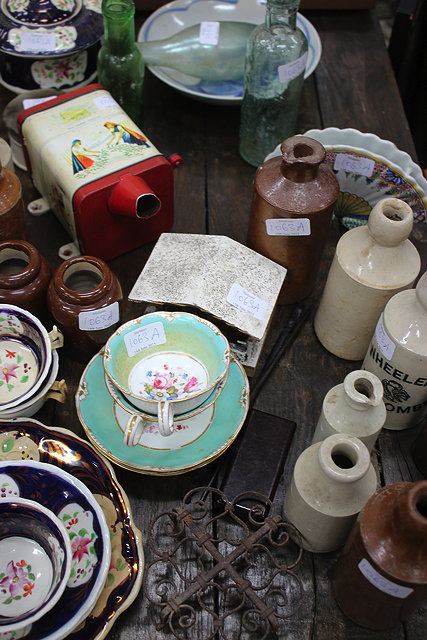 Appraisal: A COLLECTION OF VARIOUS GLASS AND STONEWARE BOTTLES ginger beer