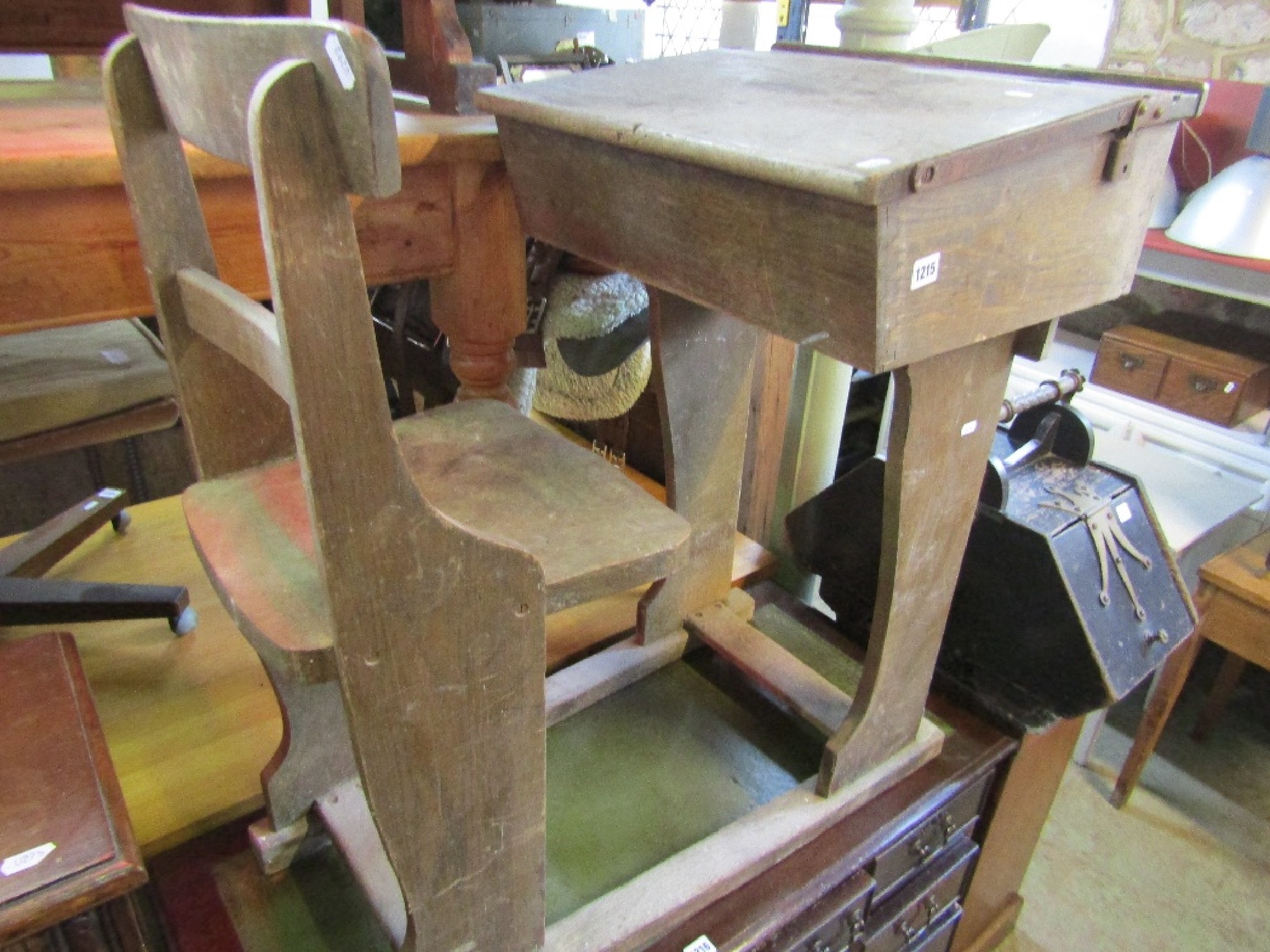 Appraisal: A vintage oak school desk and combined bar back chair