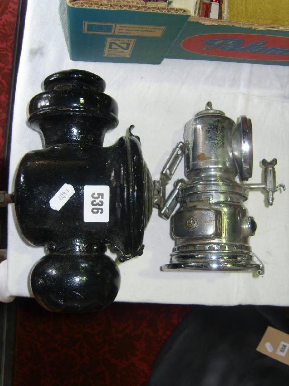 Appraisal: An early motor car tail light with oil burning fitting