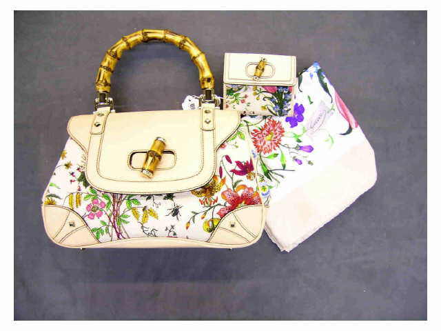 Appraisal: Gucci handbag floral twill fabric set including handbag with large