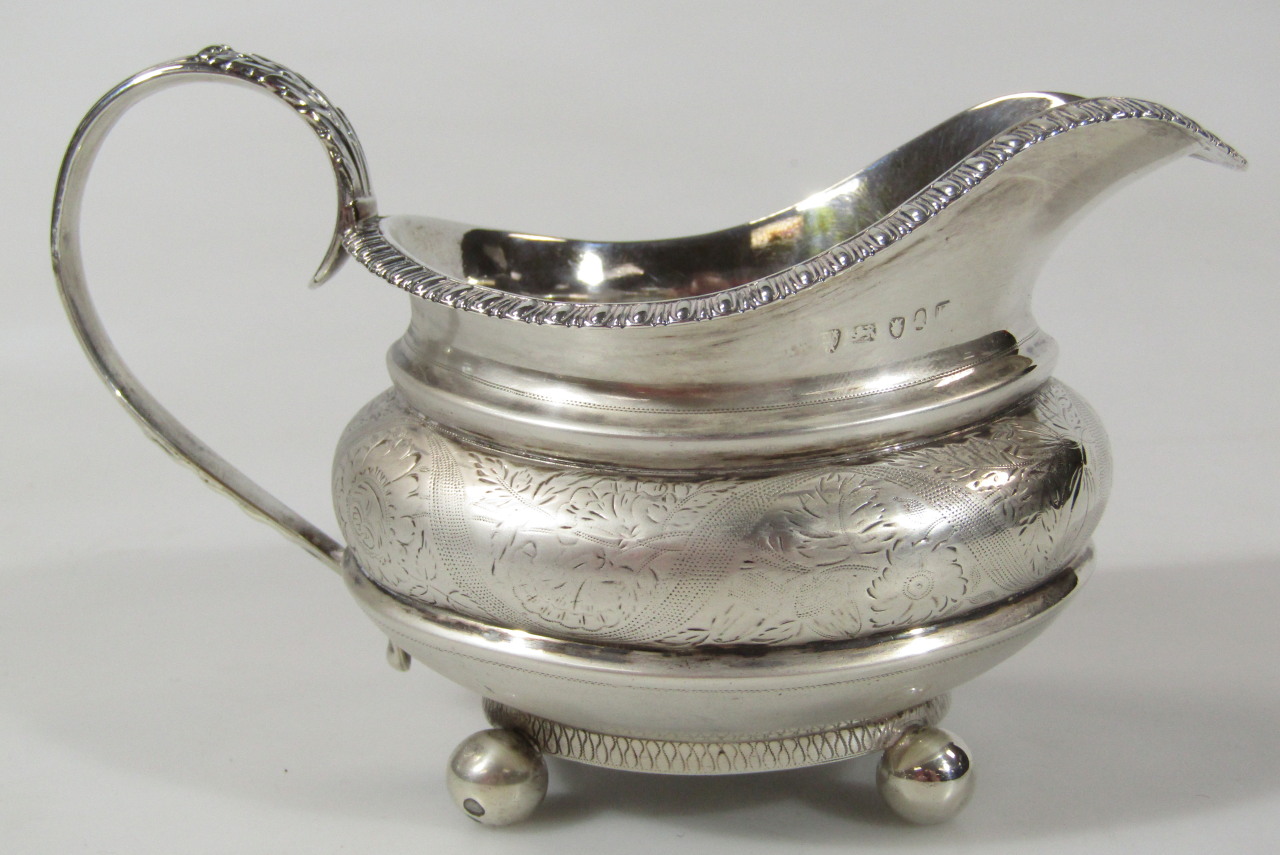 Appraisal: An early thC silver and silver gilt cream jug with