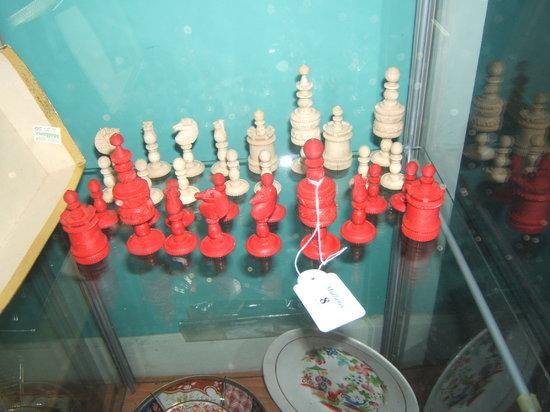 Appraisal: A th Century turned and carved bone chess set the