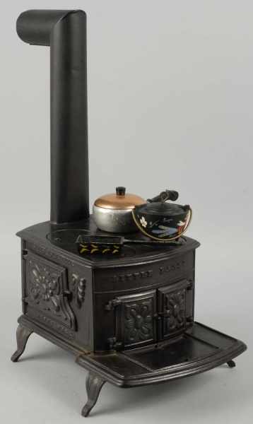 Appraisal: Cast Iron Philadelphia Little Fanny Stove Description Includes four accessories