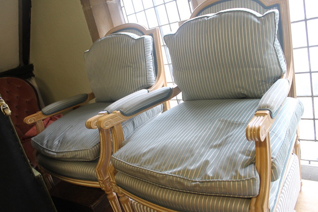 Appraisal: A PAIR OF FRENCH BEECHWOOD ARMCHAIRS of stylised form with