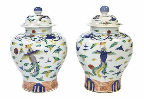 Appraisal: A Near Pair of Wucai Ginger Jars each having a