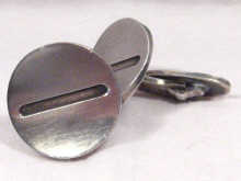 Appraisal: A pair of silver cufflinks by George Jensen circa