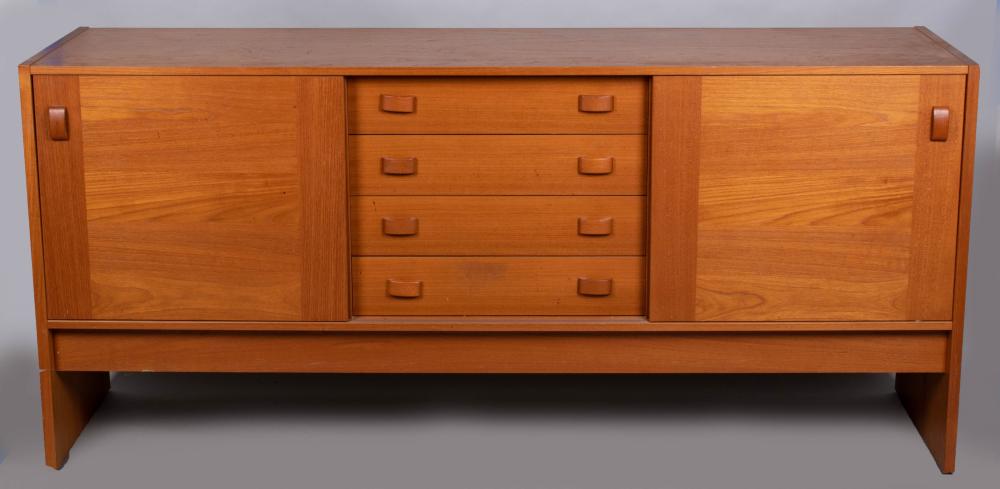 Appraisal: DOMINO MOBLER TEAK SIDEBOARD CIRCA the rectangular case fitted centrally