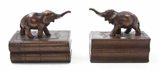 Appraisal: A Pair of Cast Metal Bookends in the form of