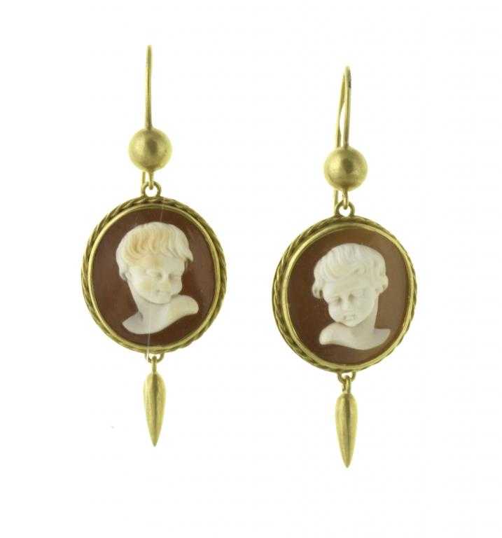 Appraisal: A PAIR OF VICTORIAN CAMEO EARRINGS each with an almost