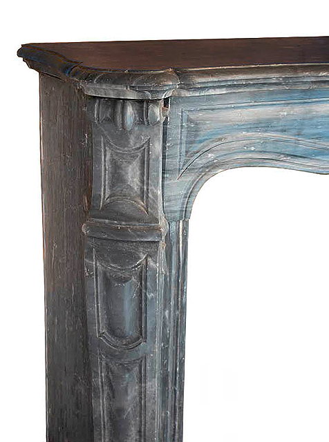 Appraisal: A FRENCH GREY MARBLE FIRE SURROUND with serpentine mantlepiece and