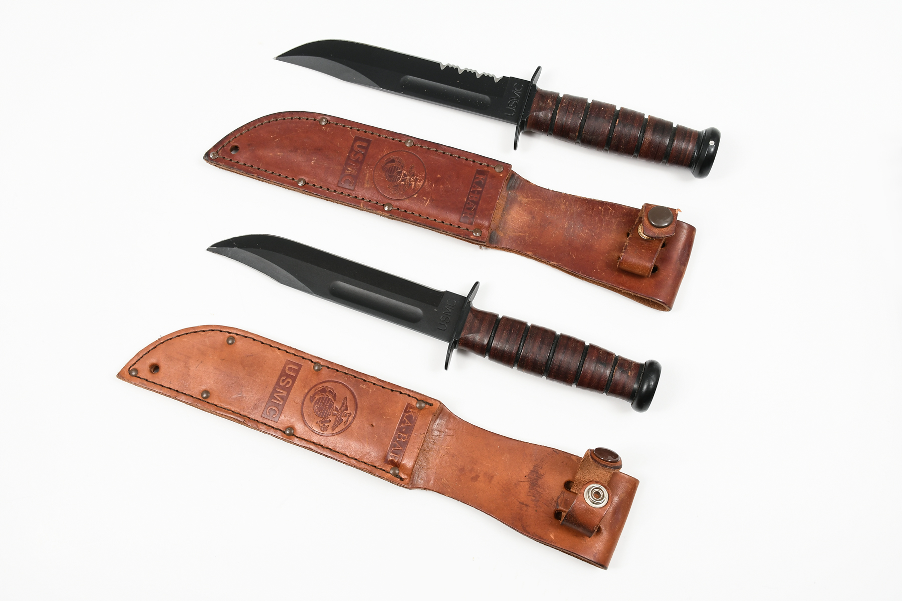 Appraisal: TWO KA-BAR USMC KNIVES WITH SHEATHES See photos for condition