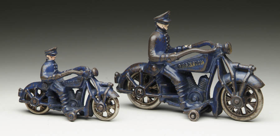 Appraisal: PAIR OF CHAMPION MOTORCYCLES Large Champion motorcycle painted blue embossed