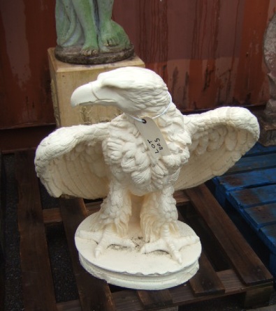 Appraisal: A th century terracotta figure of a golden eagle in